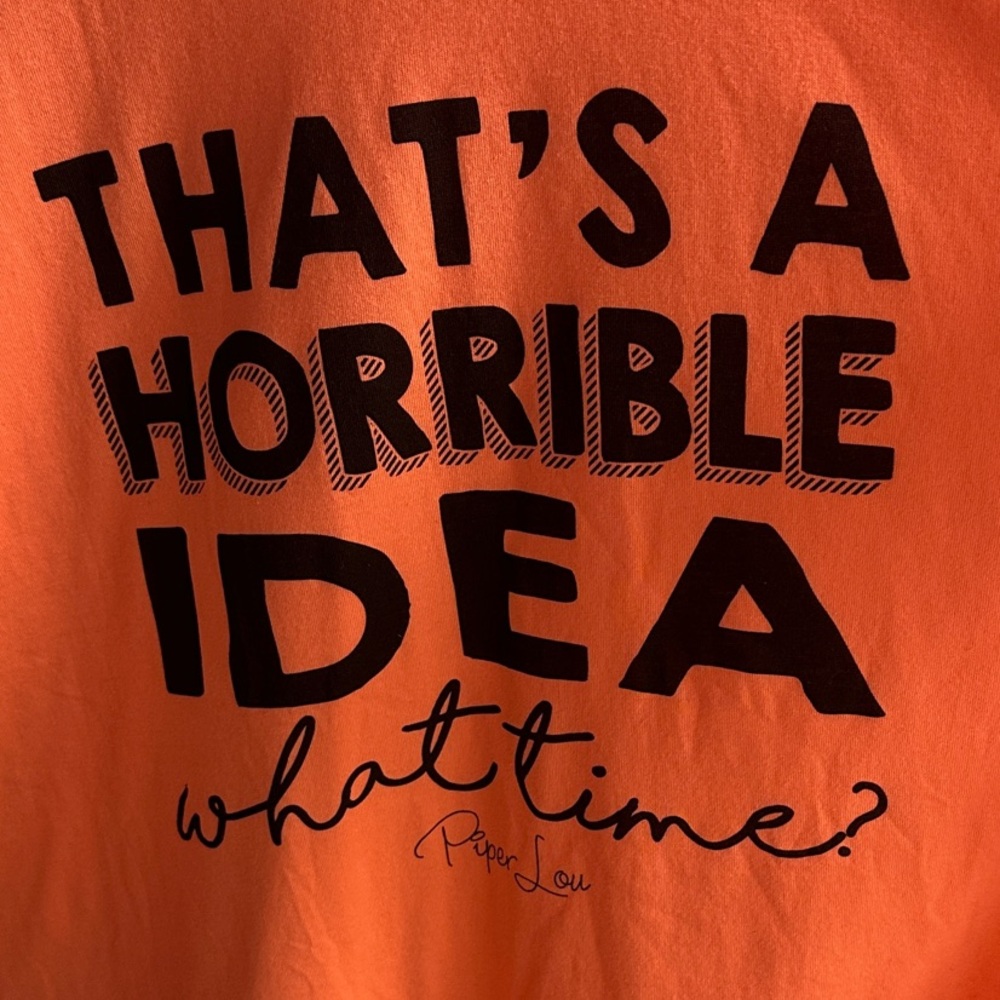 Orange Tee with Black Text